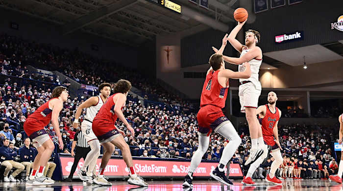 Gonzaga forward Drew Timme (2) shoots the ball against St. Mary's center Mitchell Saxen (10).
